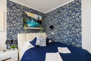 UnitApartments Rondo ONZ 3-pokojowe Apartamenty w Centrum Warszawy 1-8 osób Parking Metro WIFI Winda