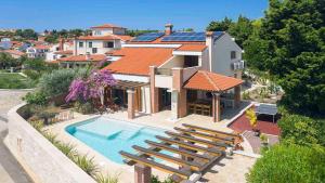 Modern poolside villa in Premantura 