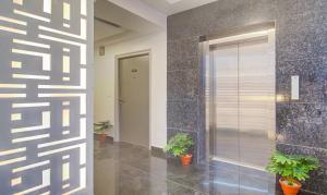 Treebo De Alphabet Kondapur