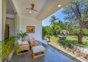 SaffronStays 7 Seas - 7BR pool villa with gazebo, bar & lawn, perfect for celebrations near Mandwa Jetty