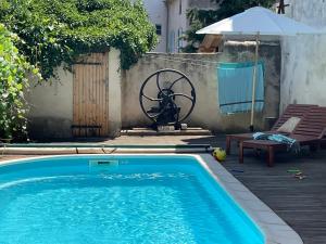 Maisons de vacances Charming village house with pool : photos des chambres