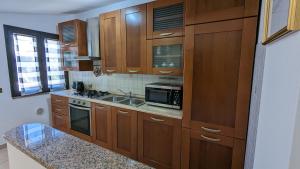 Grazioso e confortevole attico, costa sud-ovest img3