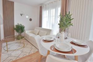 Appartements L'Olivier Centre ville Parking Disneyland 4 personnes et 1 bebe : photos des chambres