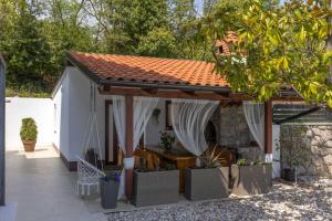 Piccola Villa Adriatic with a swimming pool, grill, children playground Opatija