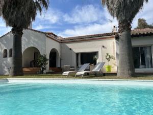 Villas Villa avec magnifique piscine et grand jardin, a 2 pas du golf et de la plage : photos des chambres