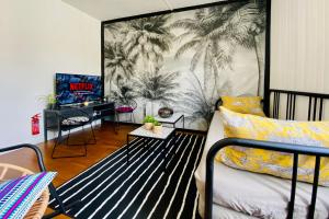 Maisons de vacances La Maison des Plantes, charmante, atypique et cosy pour 4 personnes avec parking et jardin : photos des chambres