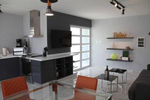 Xevize Apartment 4 - 3hvězdičkové hotely ve městě Palm-Eagle Beach