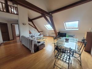 Appartements Chaleureux duplex en Alsace : photos des chambres