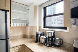 Midtown E 1BR Office nook Doorman Gym NYC-43