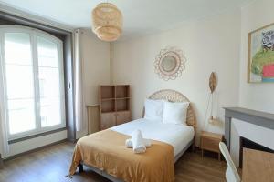 Appartements Le Bon Repos-ESA/UCO avec jardin : photos des chambres