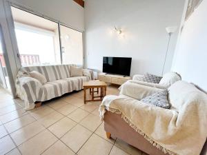 Appartements T3 Vue 180° sur la Marina : photos des chambres