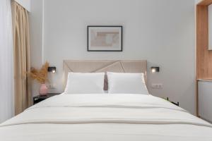 ΙΩΚΑ Suites the Urbitality Project