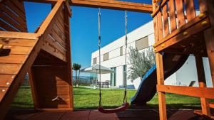 A modern villa in Zmijavci with a gym, tennis and basketball court