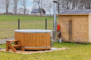 Domki Wakacyjne "Wolności" - Grill, Relax w Balii z Jacuzzi & Taras by Noclegi Renters