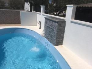 Apartment in Rogoznica with balcony, air conditioning, WiFi, washing machine 5173-1 