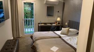 Hotels Hotel Acadie Paris Villepinte : photos des chambres