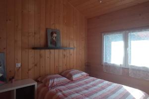 Chalets Chalet sur le lac : photos des chambres