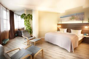 Family Room room in Hotel Kiel by Golden Tulip