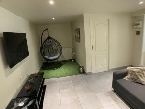 Appartements Appartement cosy proche Roissy CDG Asterix DisneyLand Paris : photos des chambres