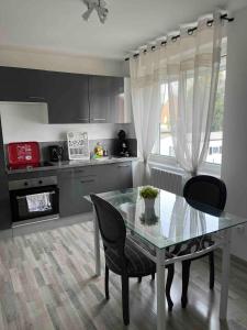 Appartements Gites « la perle bleue » & « le coin cosy » : photos des chambres