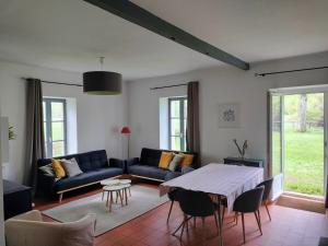 Appartements MAISON DE PIERRE : photos des chambres