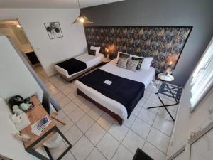 Hotels Cit'Hotel Les Atlantes : photos des chambres