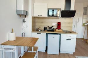 Appartements Studio cosy centre ville 2pers wifi : photos des chambres