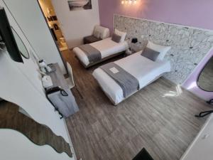 Hotels Cit'Hotel Les Atlantes : photos des chambres