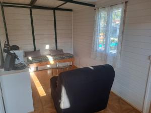 Campings Chalet pour 5 personnes equipe sur emplacement privatif dans camping 4 etoiles appartenant et gere par un particulier : photos des chambres