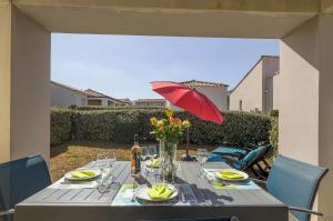 Maisons de vacances Carlandria - Charmante maisonnette avec piscine partagee : photos des chambres