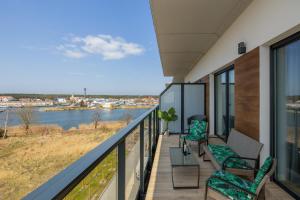 Wellness & SPA Resort Dziwnów Riverfront Apartments with AC & Parking by Renters