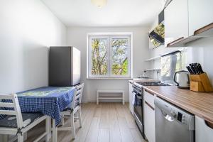 Wiktorska Blue Studio by BookingHost