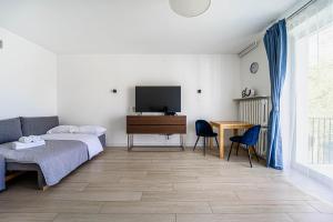 Wiktorska Blue Studio by BookingHost