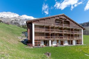 Appartements La Ferme des Alpages - Proche pistes de ski : photos des chambres