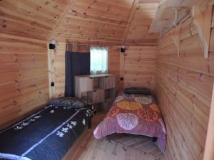 Chalets CHALET ATYPIQUE LOLA type KOTA location en gite : photos des chambres