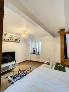 Appartements Le Charmant Triplex L'authentique TopExperience gare 6 pers : photos des chambres