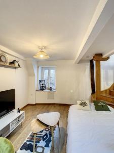 Appartements Le Charmant Triplex L'authentique TopExperience gare 6 pers : photos des chambres