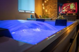 Appartements Love industrie & spa - Suite Romantique en Alsace - Terrasse et garage : photos des chambres