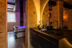 Appartements Love industrie & spa : photos des chambres