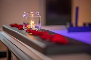 Appartements Love industrie & spa - Suite Romantique en Alsace - Terrasse et garage : photos des chambres