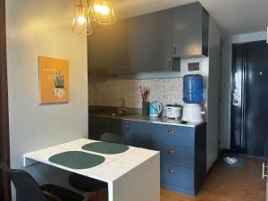 A cozy 1 br Scandinavian inspired condo unit near the beach