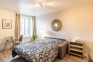 Le Magenta, Studio proche de la place Wilson