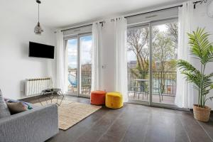 Appartements Lyon Cite-La suite Passerelle avec balcon-Caluire : photos des chambres