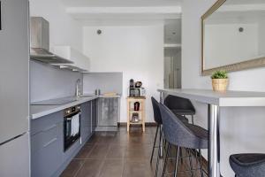 Appartements Lyon Cite-La suite Passerelle avec balcon-Caluire : photos des chambres