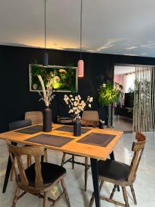 Appartements Pink Tropical Champagne : photos des chambres