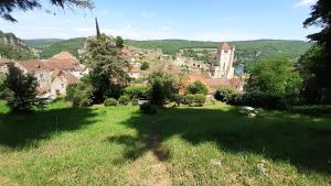 Maisons d'hotes Charme, jardin et vue panoramique coeur St-Cirq : photos des chambres