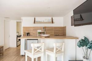 Appartements Logement quartier pavillonnaire : photos des chambres