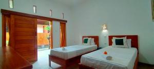 Tunjung guest house lovina beach