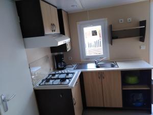 Campings Mobil home - TV - Camping '4 etoiles' - Vic-la-Gardiole - 003 : photos des chambres