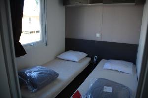 Campings Mobil home - Clim, LL, TV - Camping La Carabasse '4 etoiles' - 003 : photos des chambres